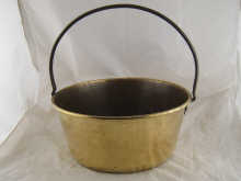 A brass preserving pan 37cm across.