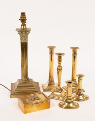 A brass reading lamp with a