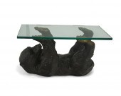 A BRASS SCULPTURAL BEAR TABLEA