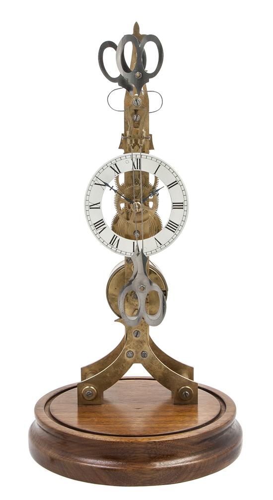 A Brass Skeleton Clock having