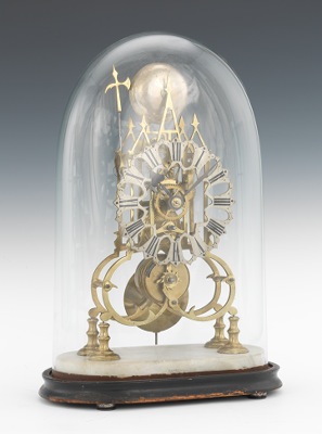 A Brass Skeleton Clock in Glass