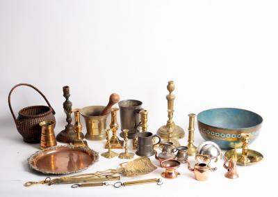 A brass skimmer, a mortar and a
