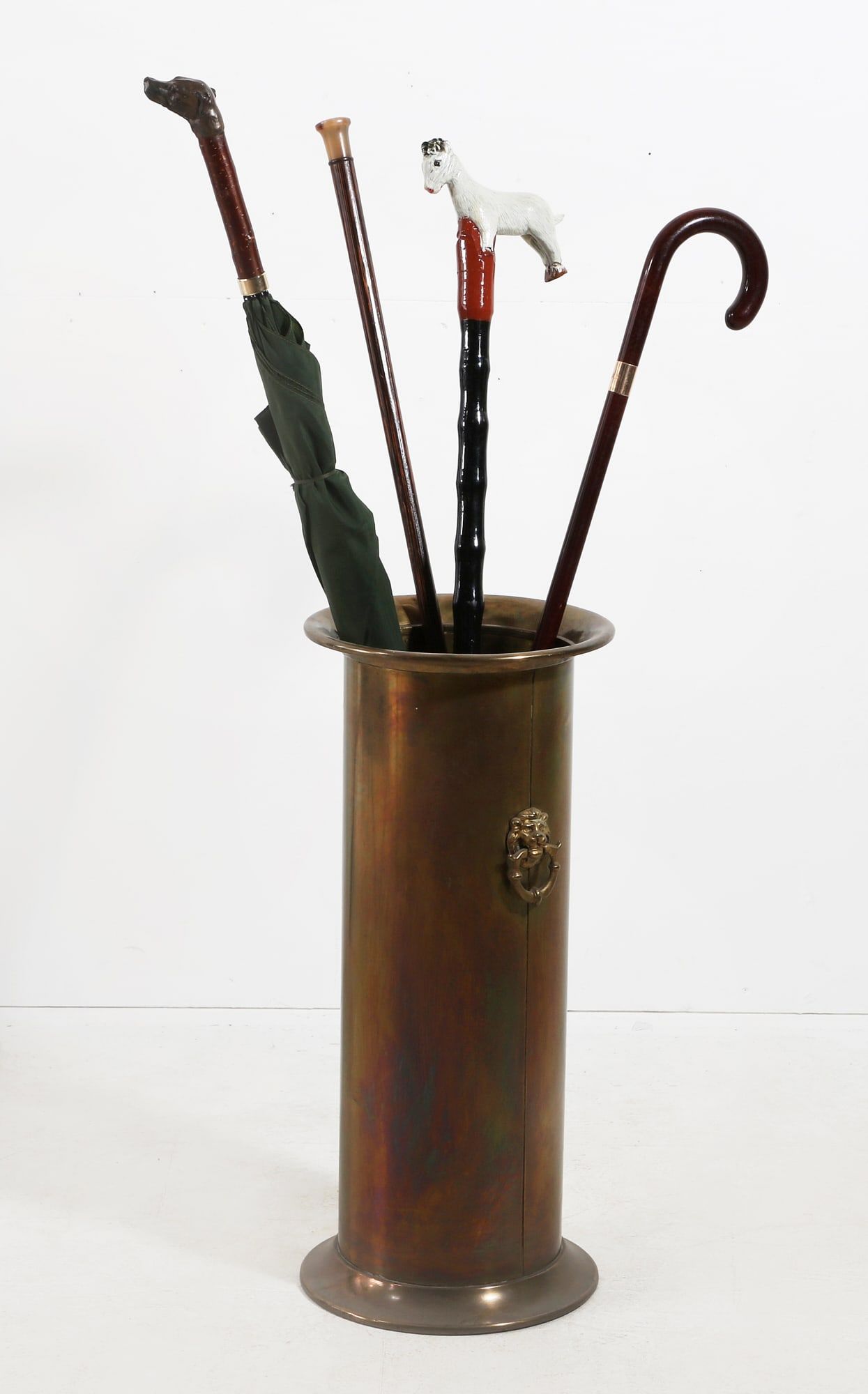 A BRASS STICK STAND WITH CANES