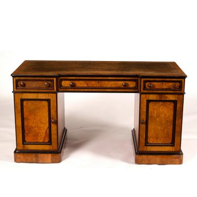 A breakfront kneehole desk by