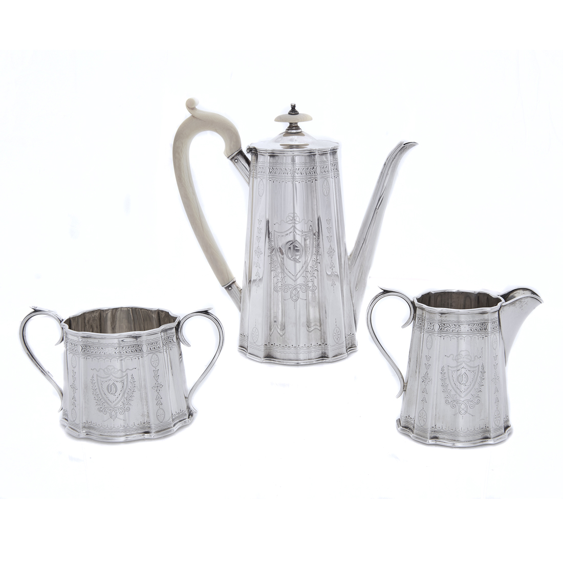 A BRITISH STERLING COFFEE SET: