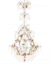 A BRONZE AND CRYSTAL CHANDELIE