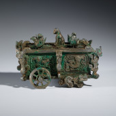 A BRONZE ARTIFACT IN CART - BO