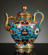 A BRONZE-BASED CLOISONNÉ ENAME