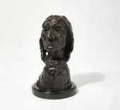 A BRONZE BUST OF A NATIVE AMER