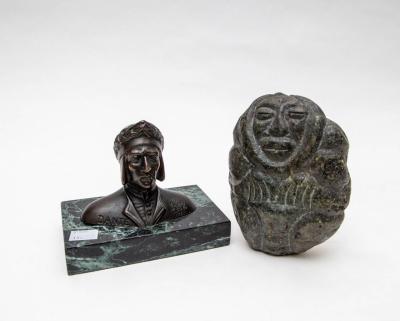 A bronze bust of Dante on a