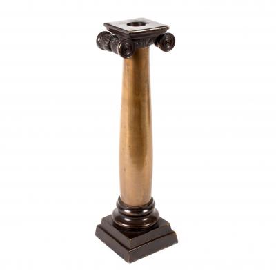 A bronze candlestick of Ionic