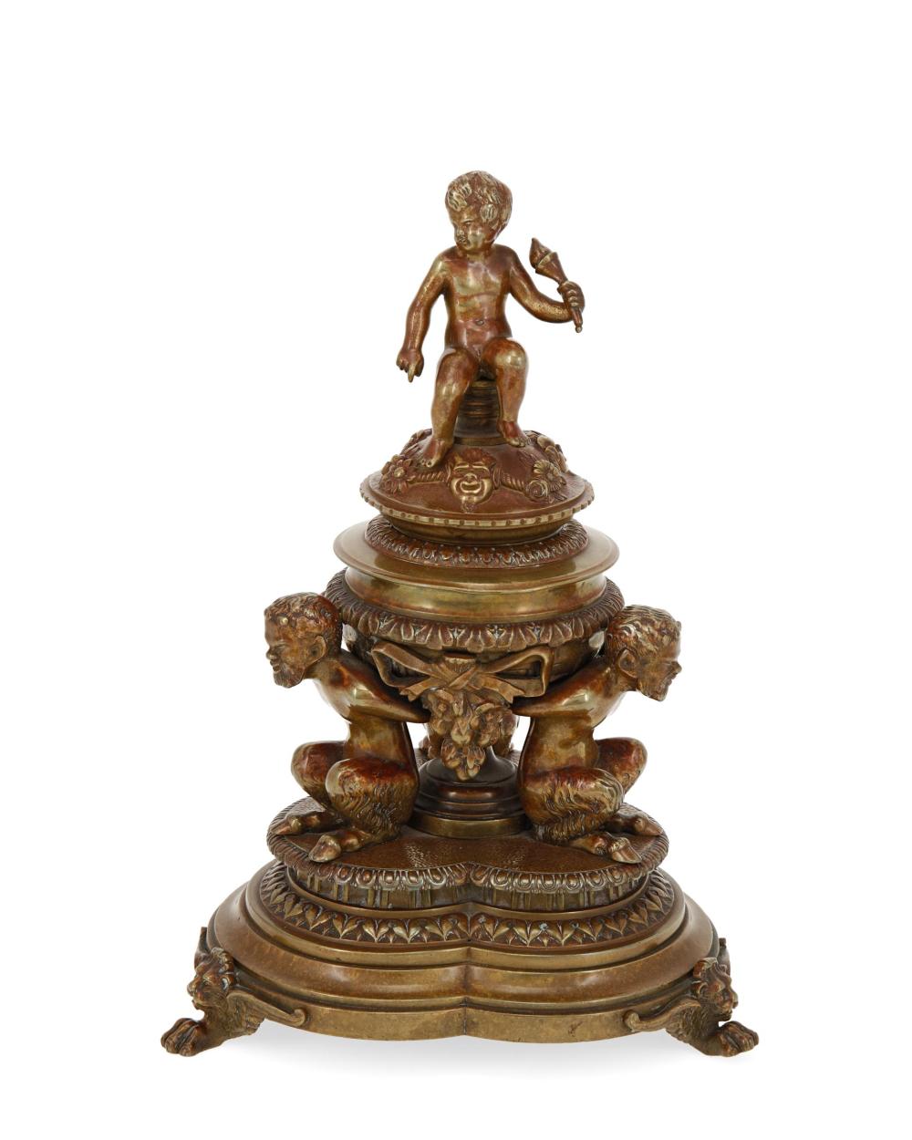 A BRONZE FIGURAL INKWELLA bronze