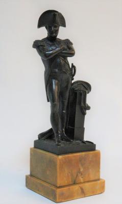 A bronze figure of Napoleon, on a