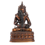 A BRONZE-GILT FIGURE OF BUDDHA