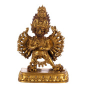 A BRONZE-GILT FIGURE OF BUDDHA