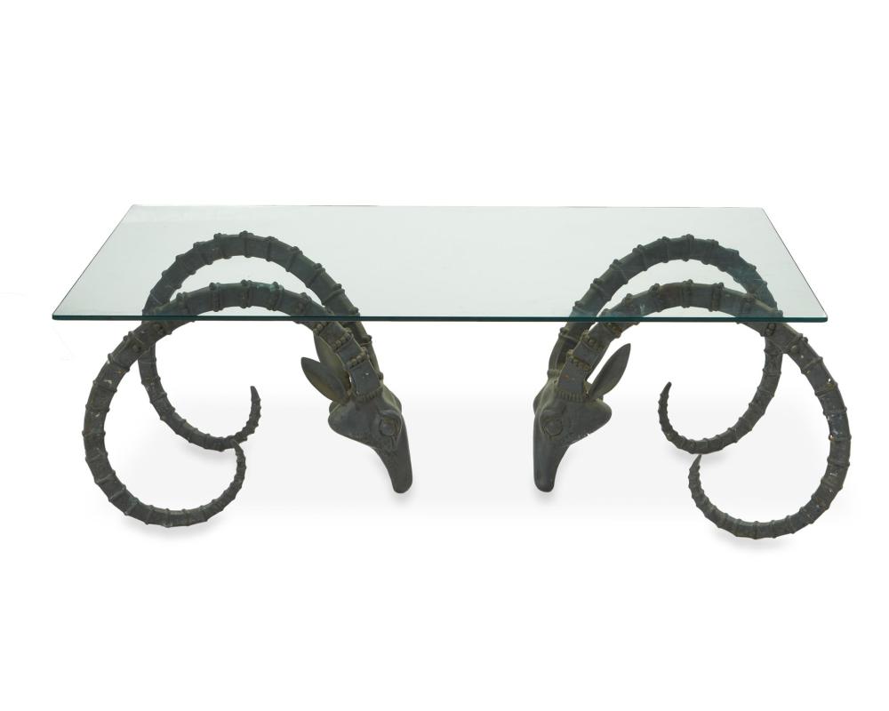 A BRONZE IBEX HEAD COFFEE TABLE,