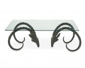 A BRONZE IBEX HEAD COFFEE TABL