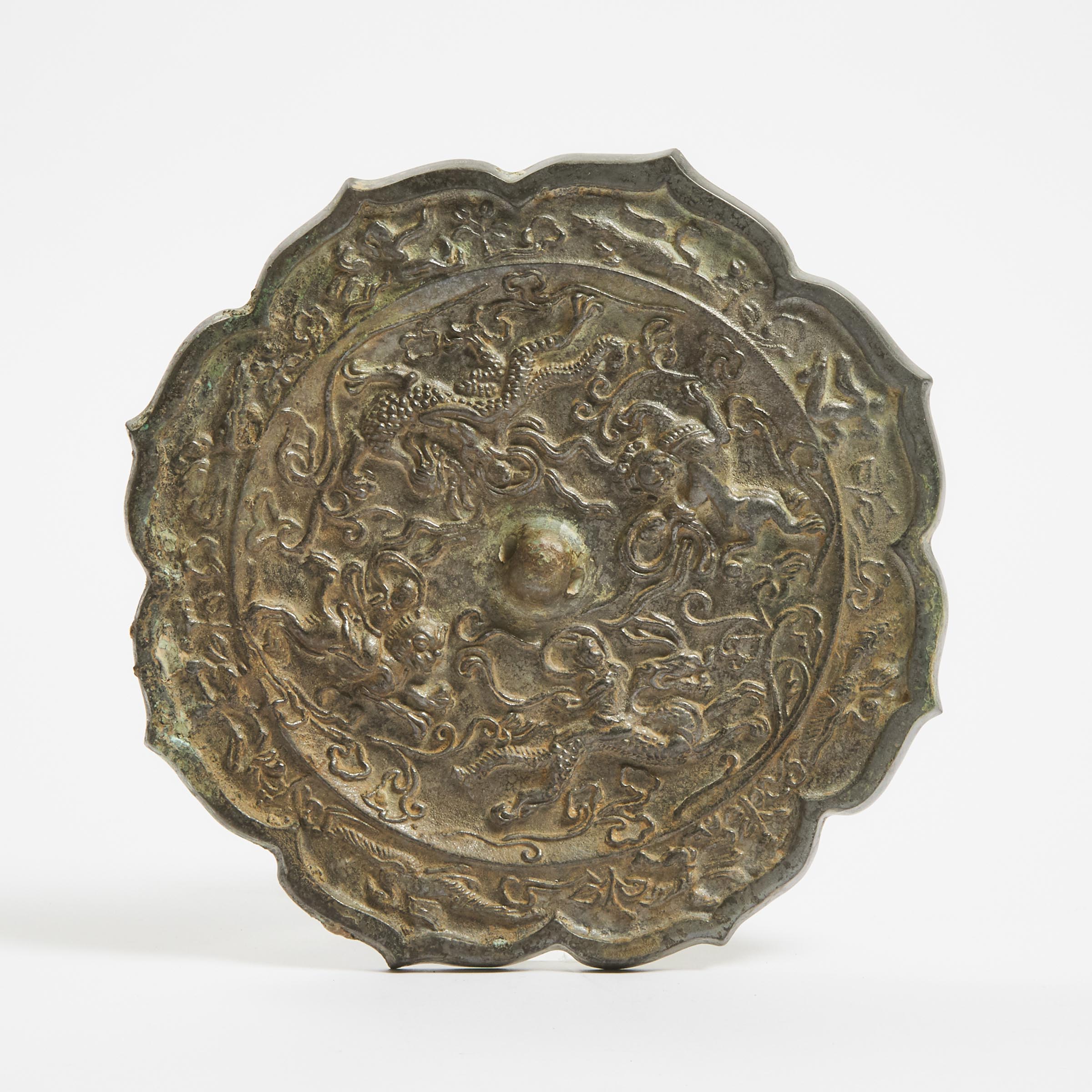 A Bronze Lobed Octagonal Mirror,