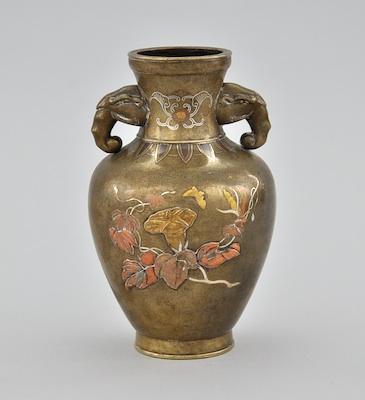 A Bronze Mixed Metals Vase The
