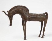 A BRONZE MODEL OF A STANDING H