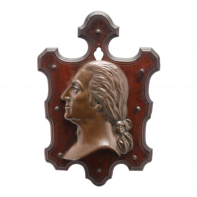A BRONZE RELIEF PORTRAIT PLAQUE