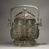 A BRONZE RITUAL WINE VESSEL AN