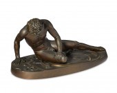 A BRONZE SCULPTURE IN THE MANN