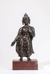 A BRONZE STANDING SHAKYAMUNI<b