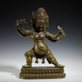 A BRONZE STATUE OF A TIBETAN B