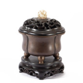A BRONZE TRIPOD CENSER AND COV