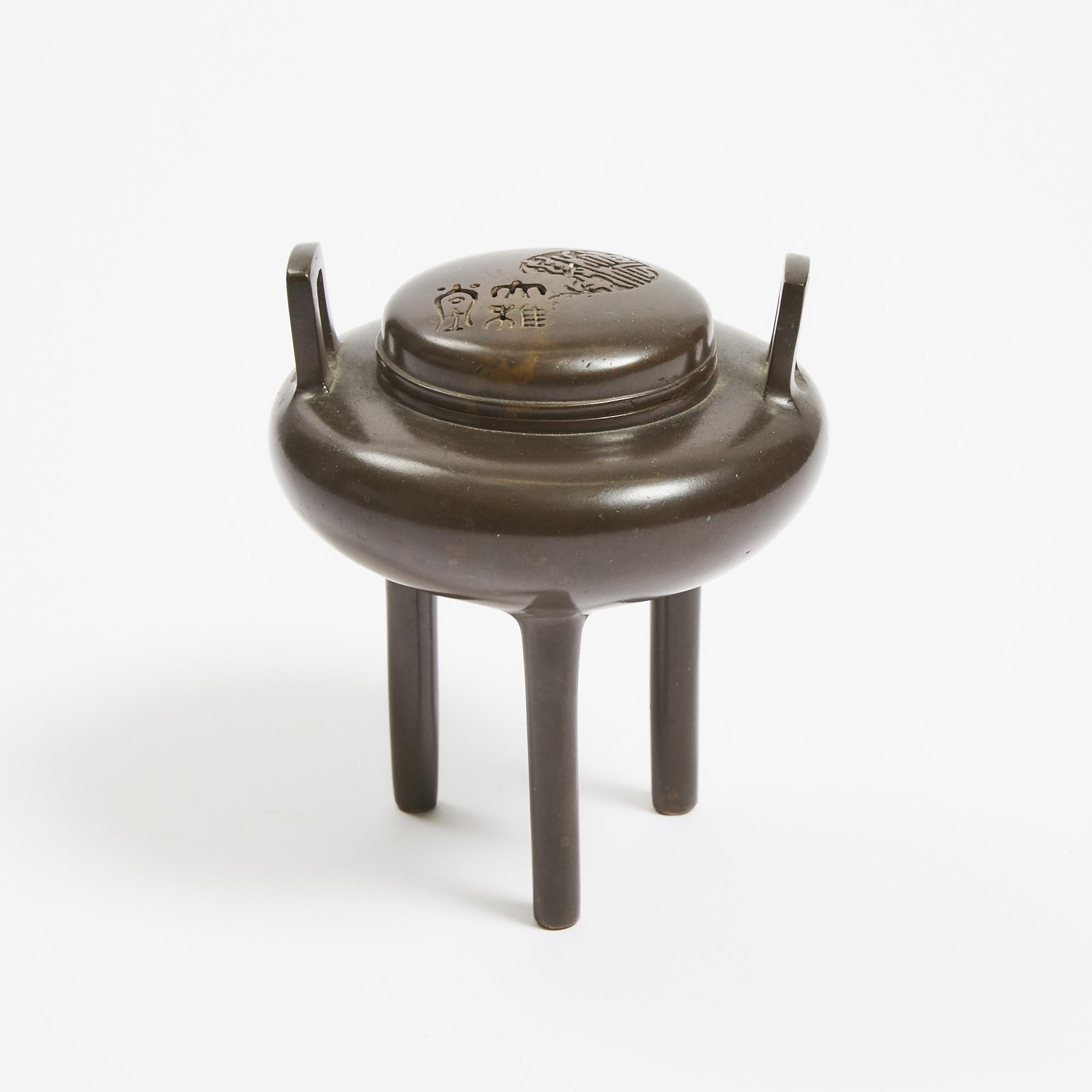 A Bronze Tripod Censer and Cover,