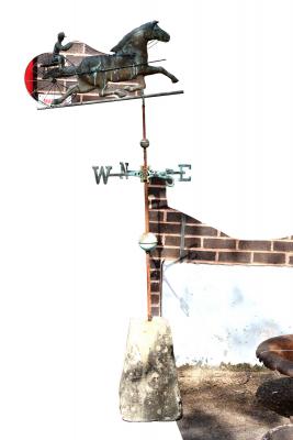 A bronze weather vane, possibly