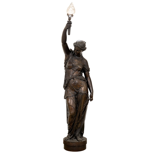 A bronzed iron life sized figural