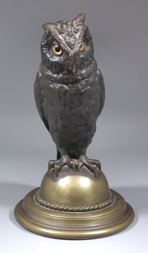 A bronzed metalware jar and cover