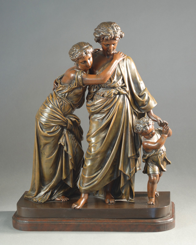 A BRONZED SPELTER PATINATED FIGURAL