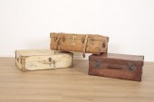 A BROWN LEATHER SUITCASE initi