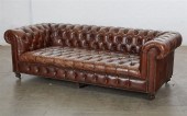 A BROWN LEATHER TUFTED CHESTER