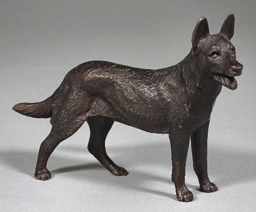 A brown patinated bronze figure -