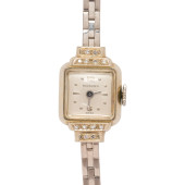 A BUCHERER 18K WHITE GOLD AND