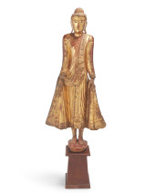 A BURMESE CARVED WOOD FIGURE O