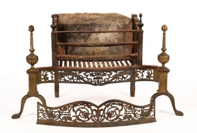 A burnished steel and brass grate
