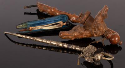 A burr wood opium pipe, the bowl in