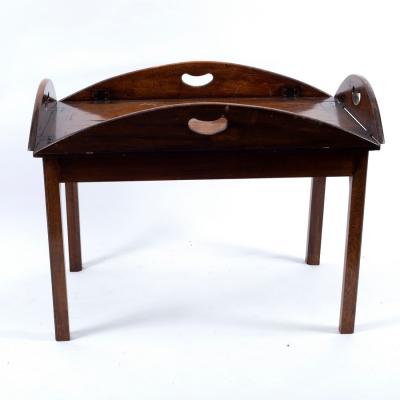 A butler's tray, the hinged sides
