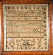 A ca. 1818 needlework alpha-nu