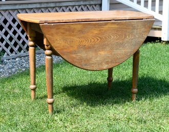 A ca. 1880's oval drop leaf