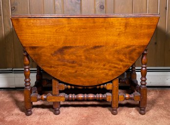 A ca. 1900 bench made cherry gate