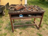 A ca. 1900 pine work bench on