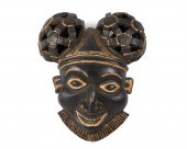 A CAMEROONIAN CARVED WOOD HELM