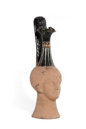 A CANOSAN POTTERY FIGURAL OINO