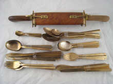 A canteen of bronze flatware
